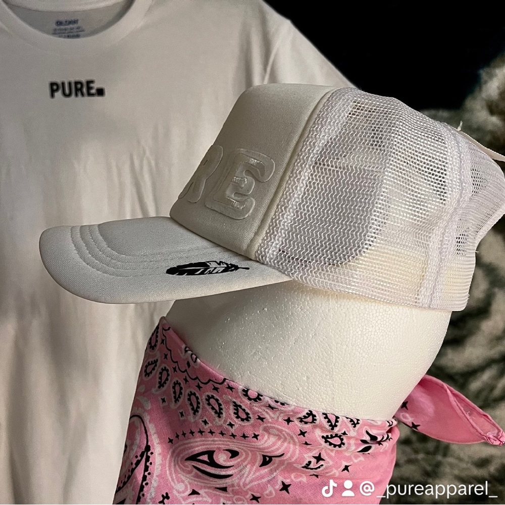 Pure apparel snap back trucker feather hat